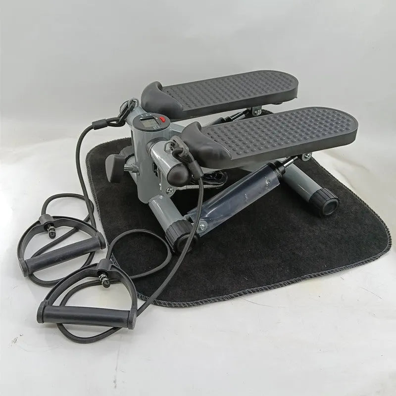 Silver grey hydraulic resistance mini treadmill exercise machine with pedal configuration
