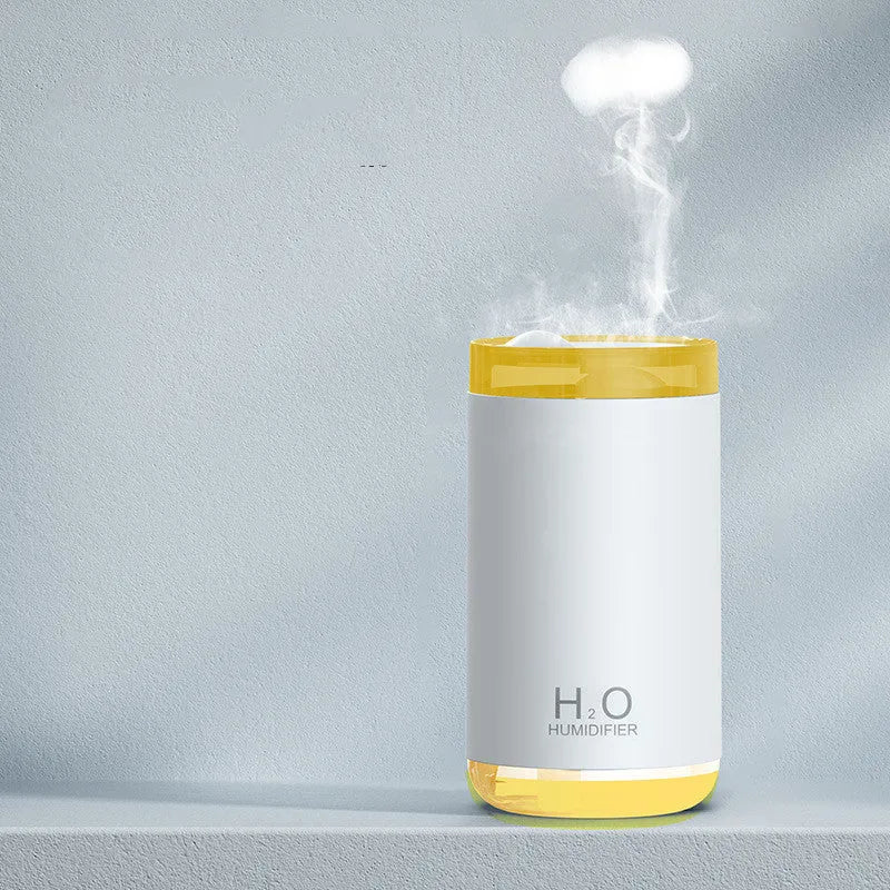 White jellyfish design USB humidifier with nano mist and warm night light on a desk