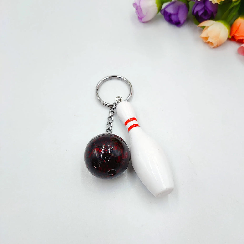 Mini simulation sports bowling keychain pendant in PVC metal on a key ring.