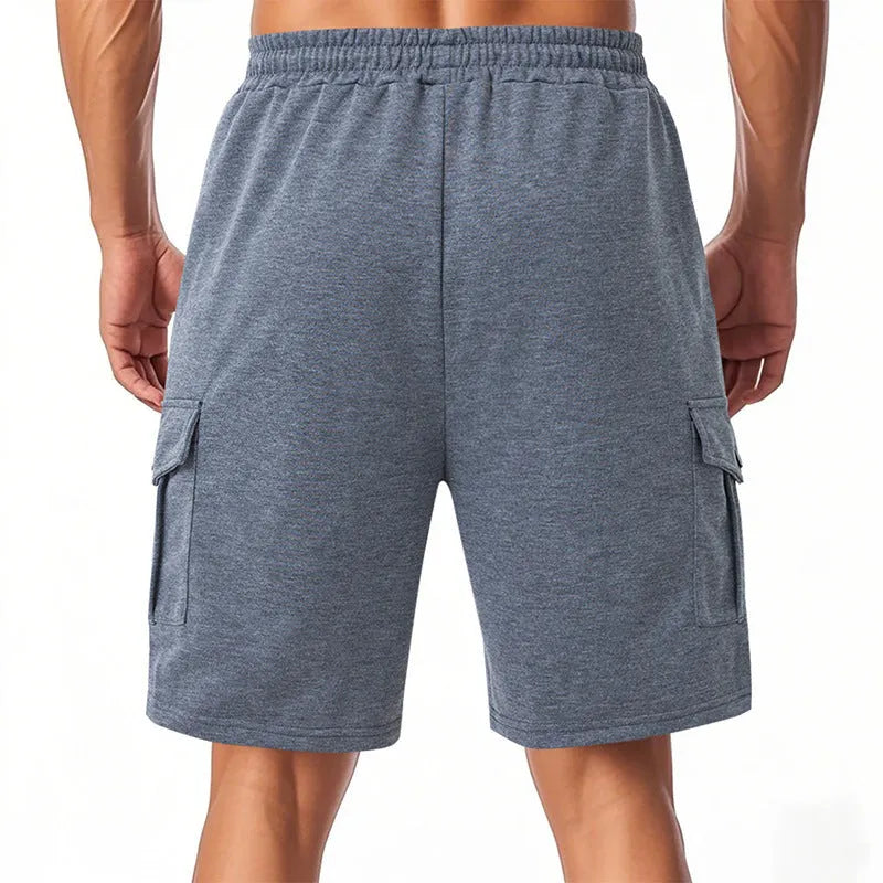 Men's loose fit cargo shorts in terry fabric with multiple pockets available in light grey, black, and dark grey colours