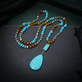 Blue turquoise heart-shaped drop pendant necklace on a long ball bead chain