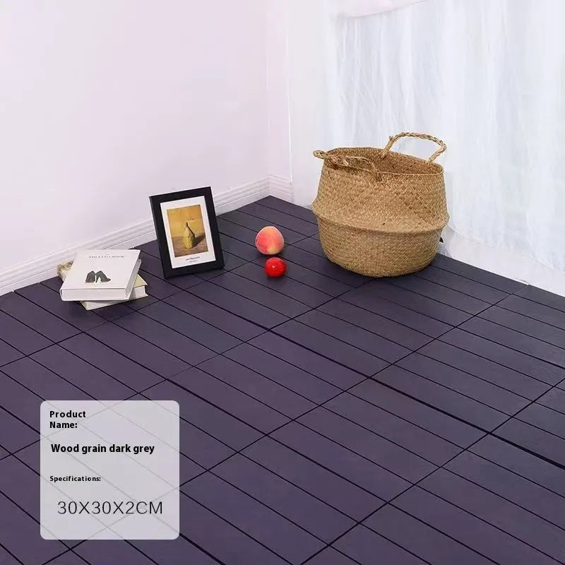 Pack of ten interlocking wood grain plastic floor tiles showing non-slip textured surface.