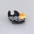 Handmade cellulose acetate hair clip with cartoon beetle design in green or orange colour options