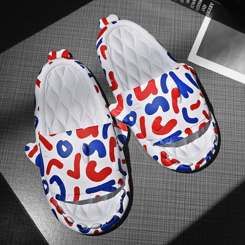 Cute shark design open toe EVA home slippers in assorted colours on a white background.