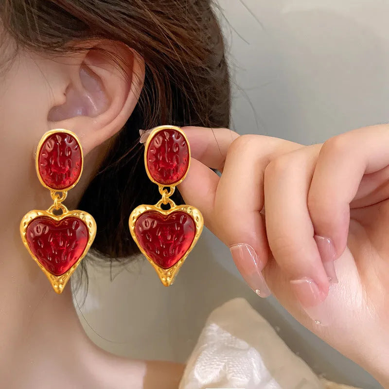 Oval love heart stud earrings with silver needle pleated finish in four colour options