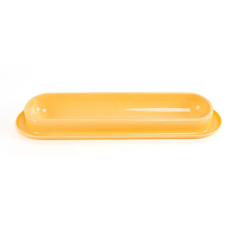 Green leakproof pet bowl set with raised feeding platform for dogs or cats.