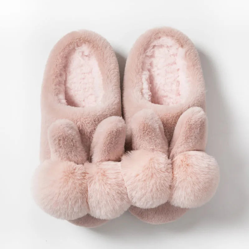 Women's fluffy rabbit fur slippers in pink with a high upper and sewn sole