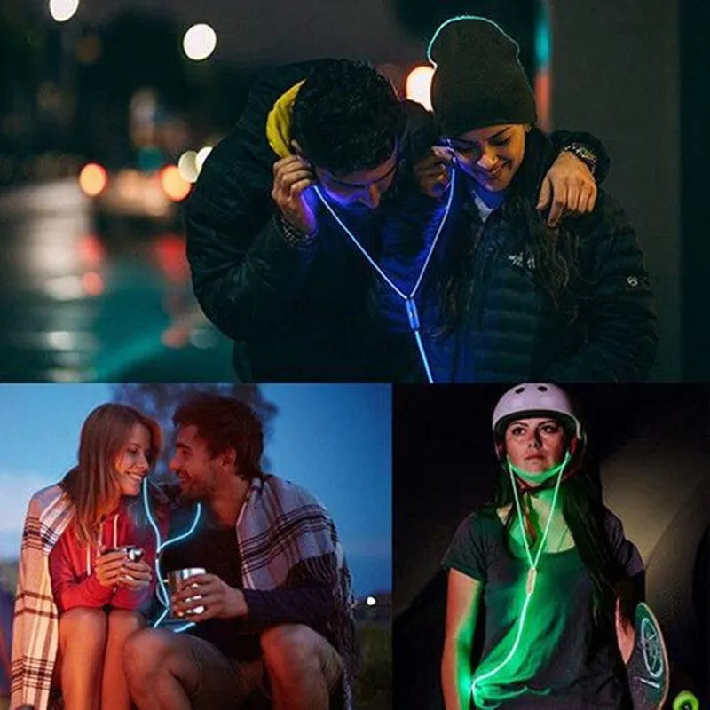 Blue LED light up earphones with 3.5mm plug and in-line remote control on a dark background