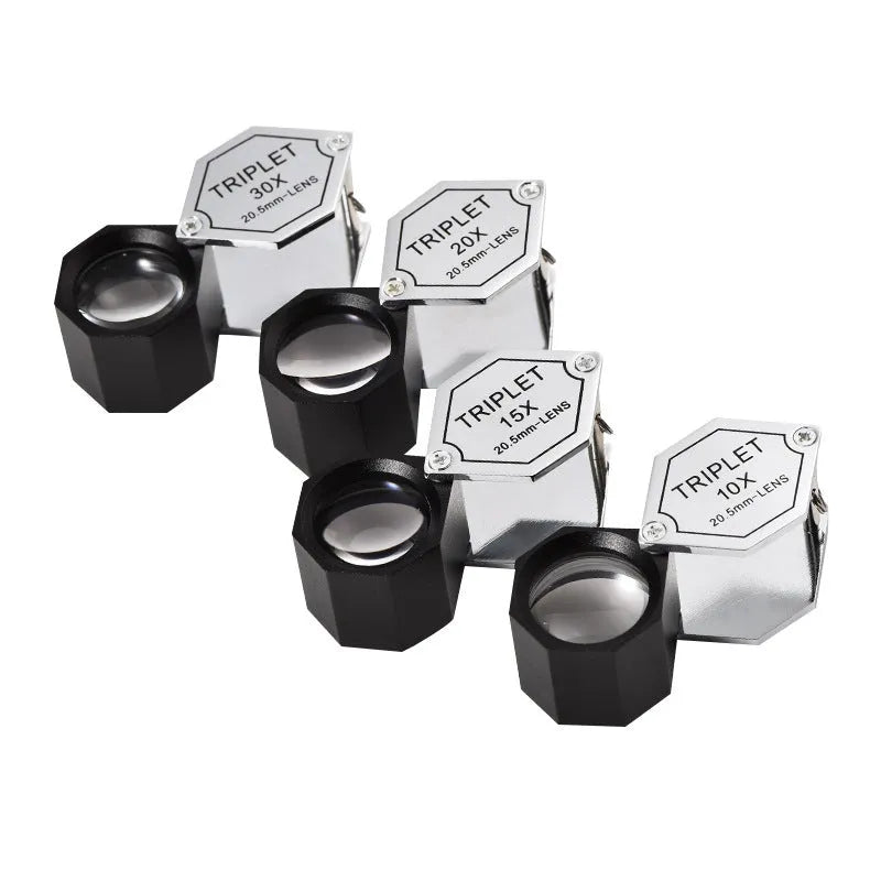 Handheld portable magnifying glass with metal body for jewellery and coin inspection