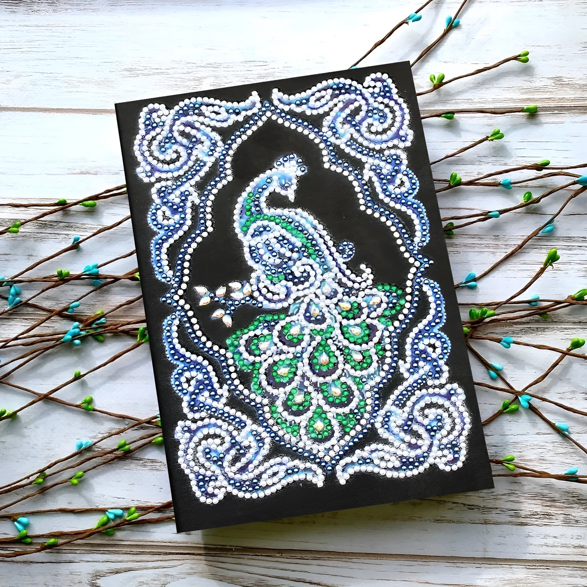 A5 peacock diamond painting notebook with shaped and bright drills, black cover, spiral binding
