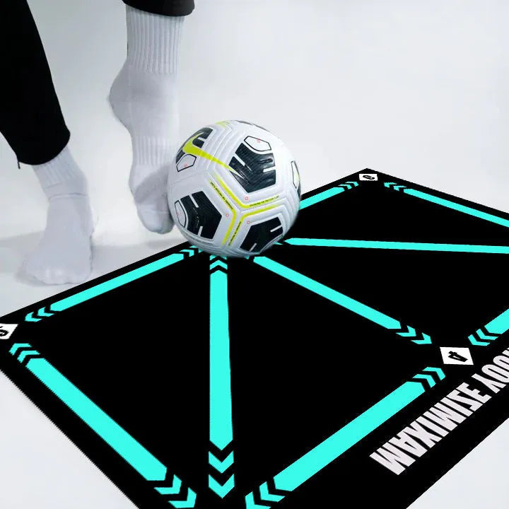 Black 60x90cm football training mat on a flat surface