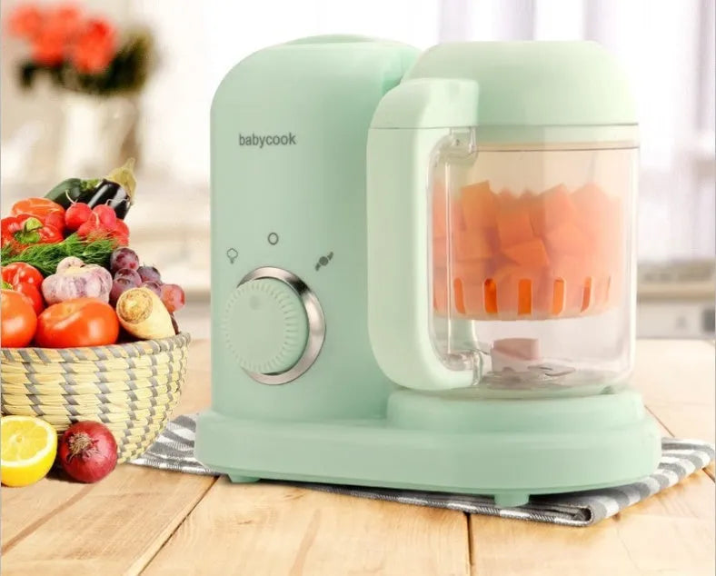 Baby food processor with steamer and blender functions in green or pink colour options