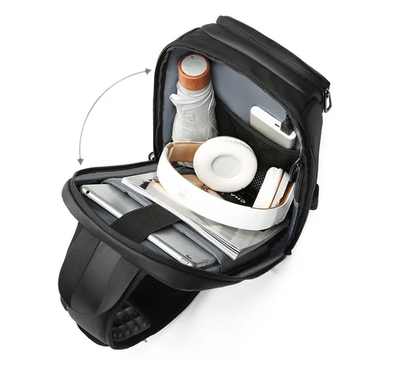 Black outdoor shoulder bag showing internal computer pocket and air cushion shoulder strap