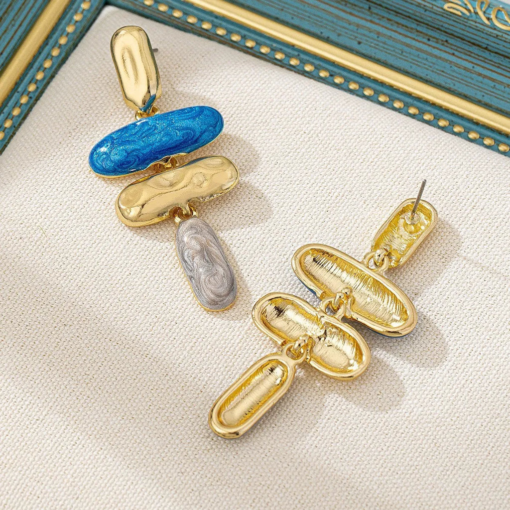 Geometric shaped stud earrings with multicolour electroplated finish on zinc alloy