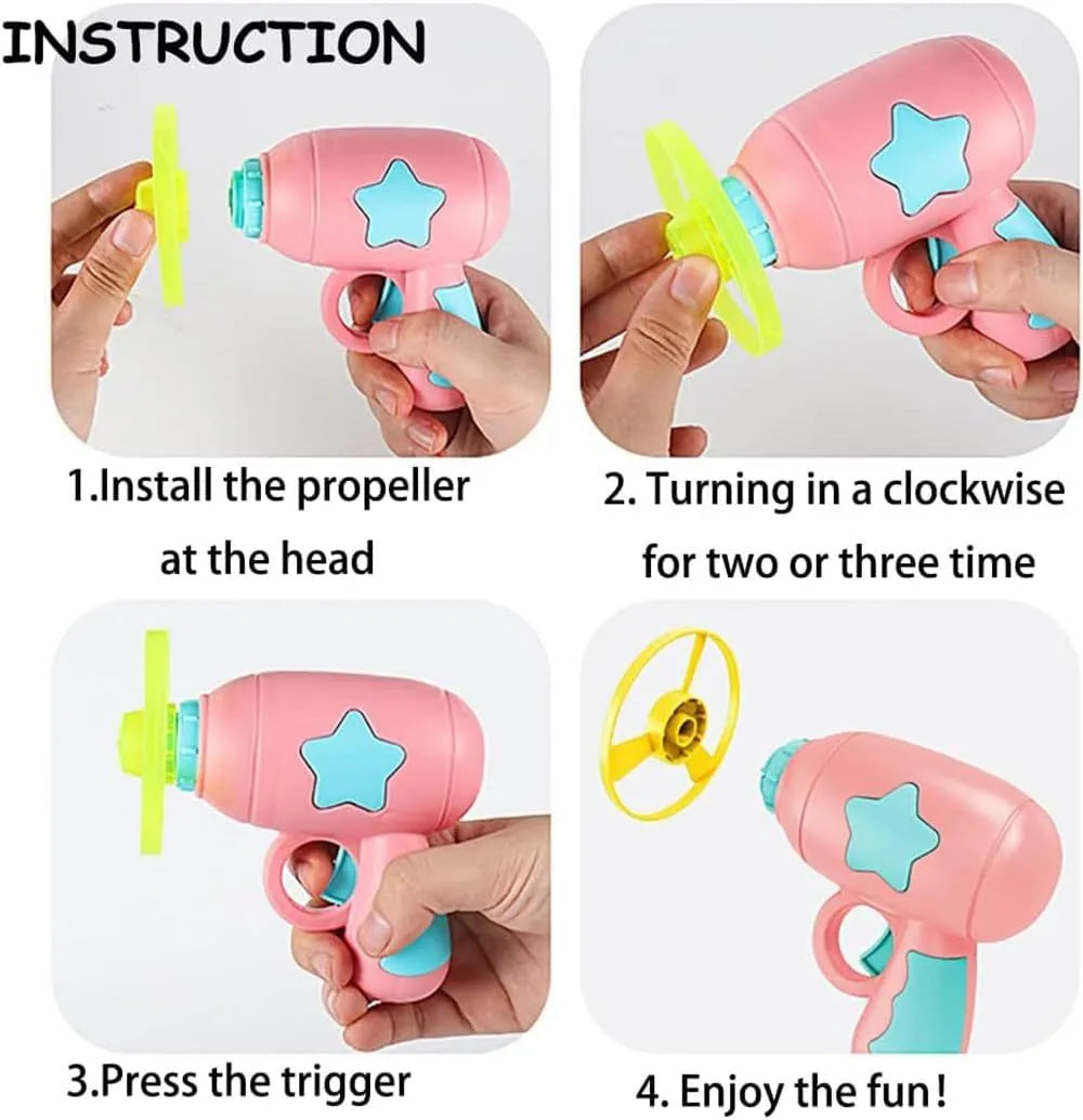 Blue and pink plastic cat toy gun with two frisbees for indoor play