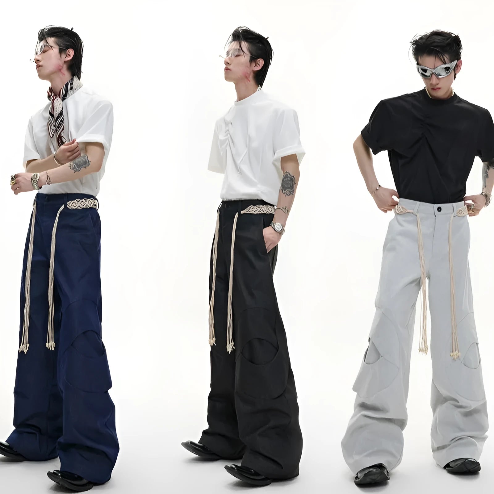 Man wearing dark blue straight-leg cotton jeans with heavy waistband stitching and decorative pocket details