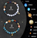 Two natural stone beaded bracelets for zodiac signs on a background.