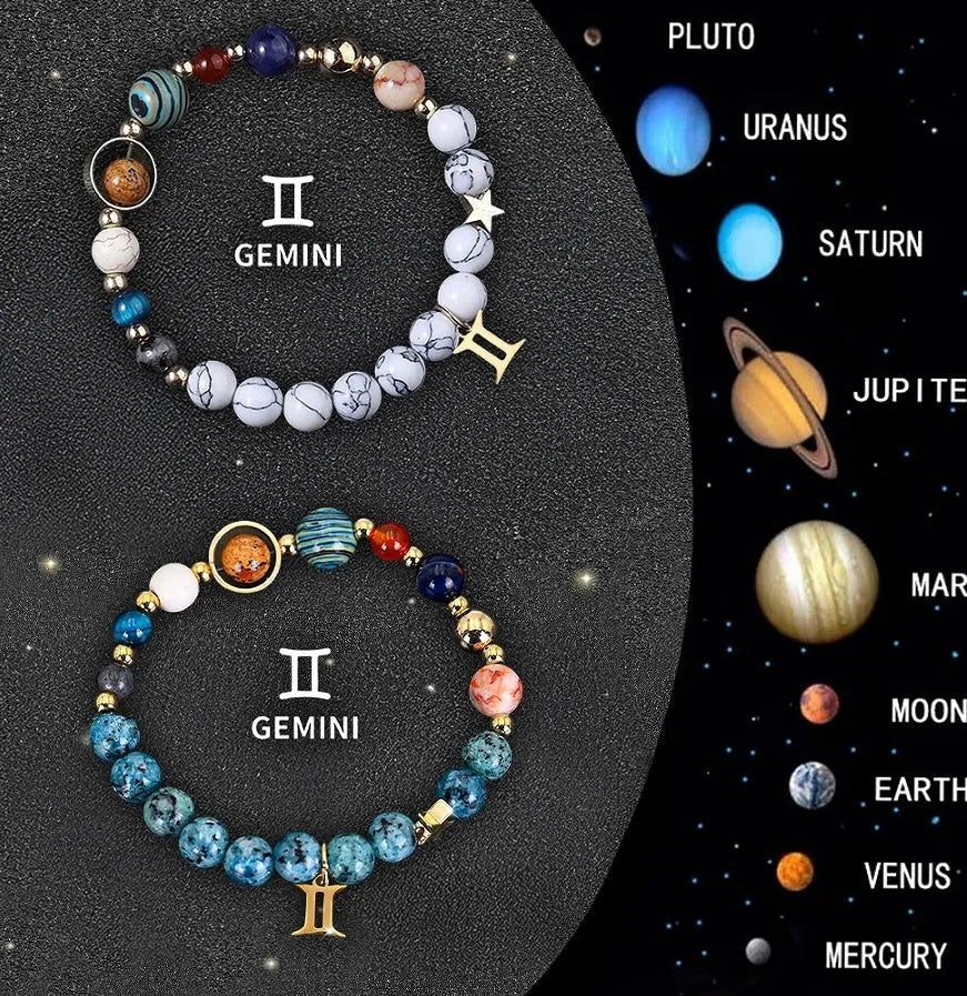 Two natural stone beaded bracelets for zodiac signs on a background.