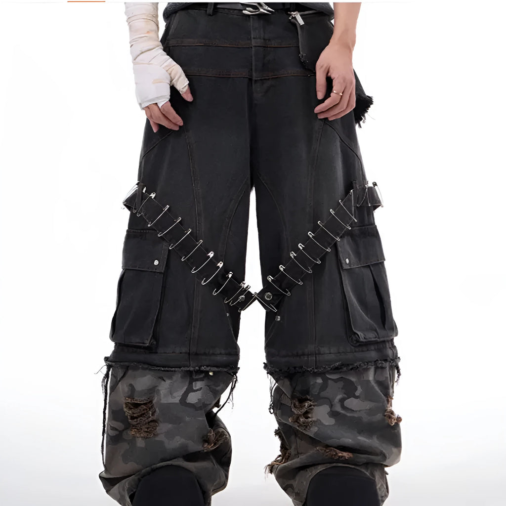Grey men's camouflage print jeans with structural splicing and ribbon detailing on cotton denim.