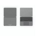 Grey Bluetooth folding keyboard unfolded next to mobile phone showing wireless connectivity for typing