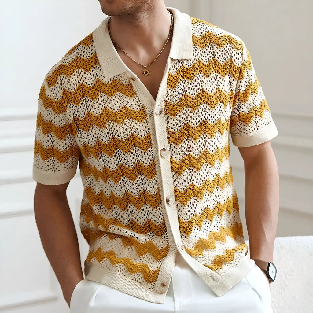 Blue hollow jacquard corrugated short sleeve sweater on a hanger, showing textured weave detail.