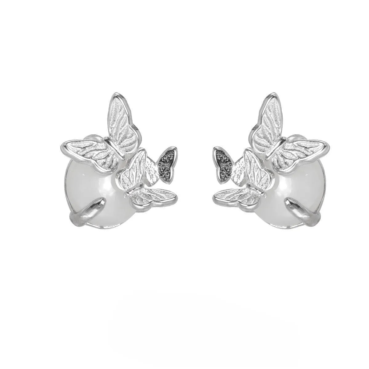 A pair of silver 925 butterfly stud earrings with an animal zodiac design in a gold colour finish.