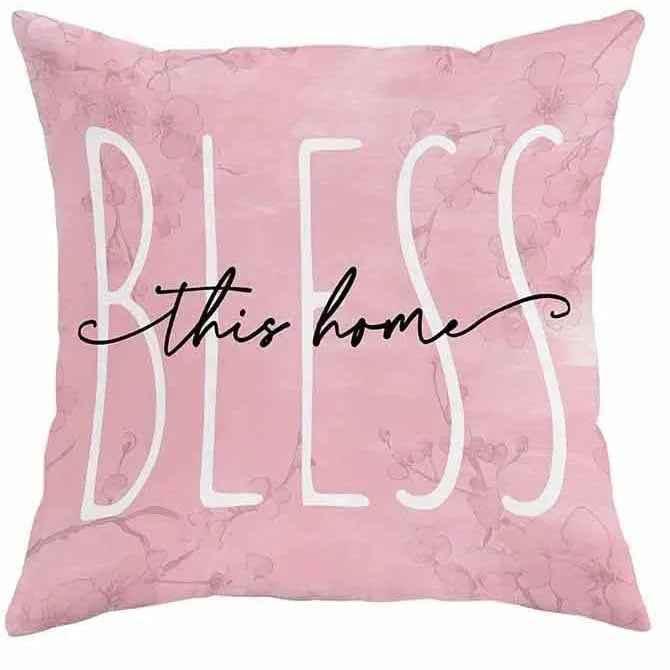 45cm square cherry blossom print cushion cover in short velvet fabric on a grey sofa.