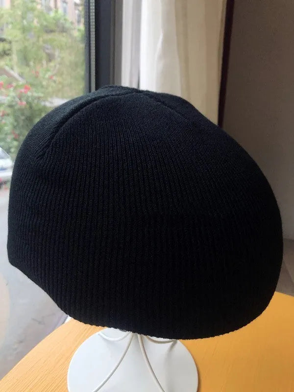 A size L decorative cover for a ski helmet, shown in one of fifteen available colour options.