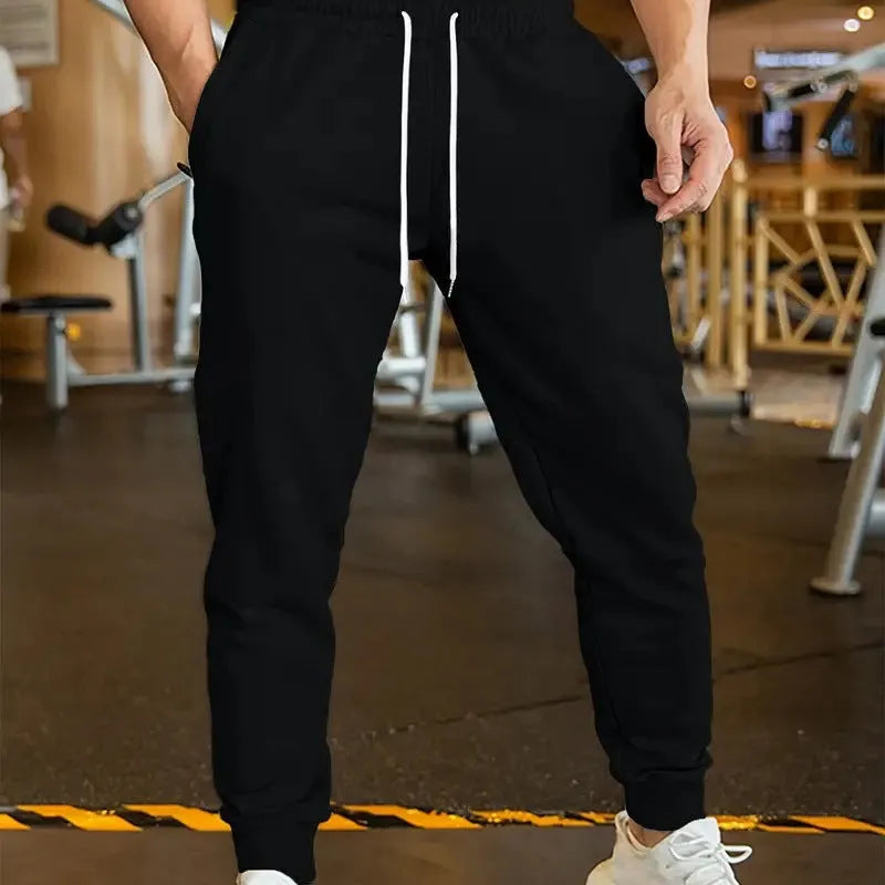 Men's linen-style leisure trousers with drawstring waist in loose fit casual design