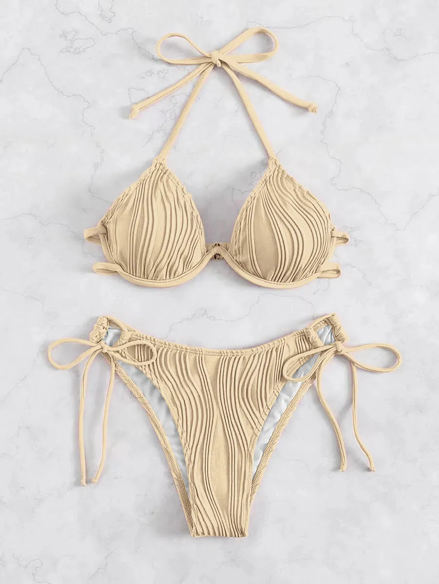 Women's apricot coloured bikini swimsuit with underwire support on a mannequin.