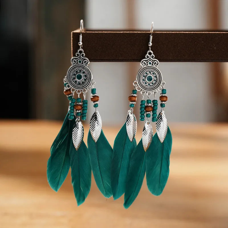 Feather pattern drop earrings with round oil craft design in alloy with electroplated finish