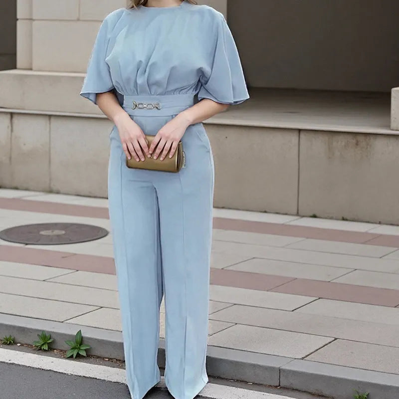 Blue men's casual polyester suit set with trousers and a long-sleeved shirt on a mannequin