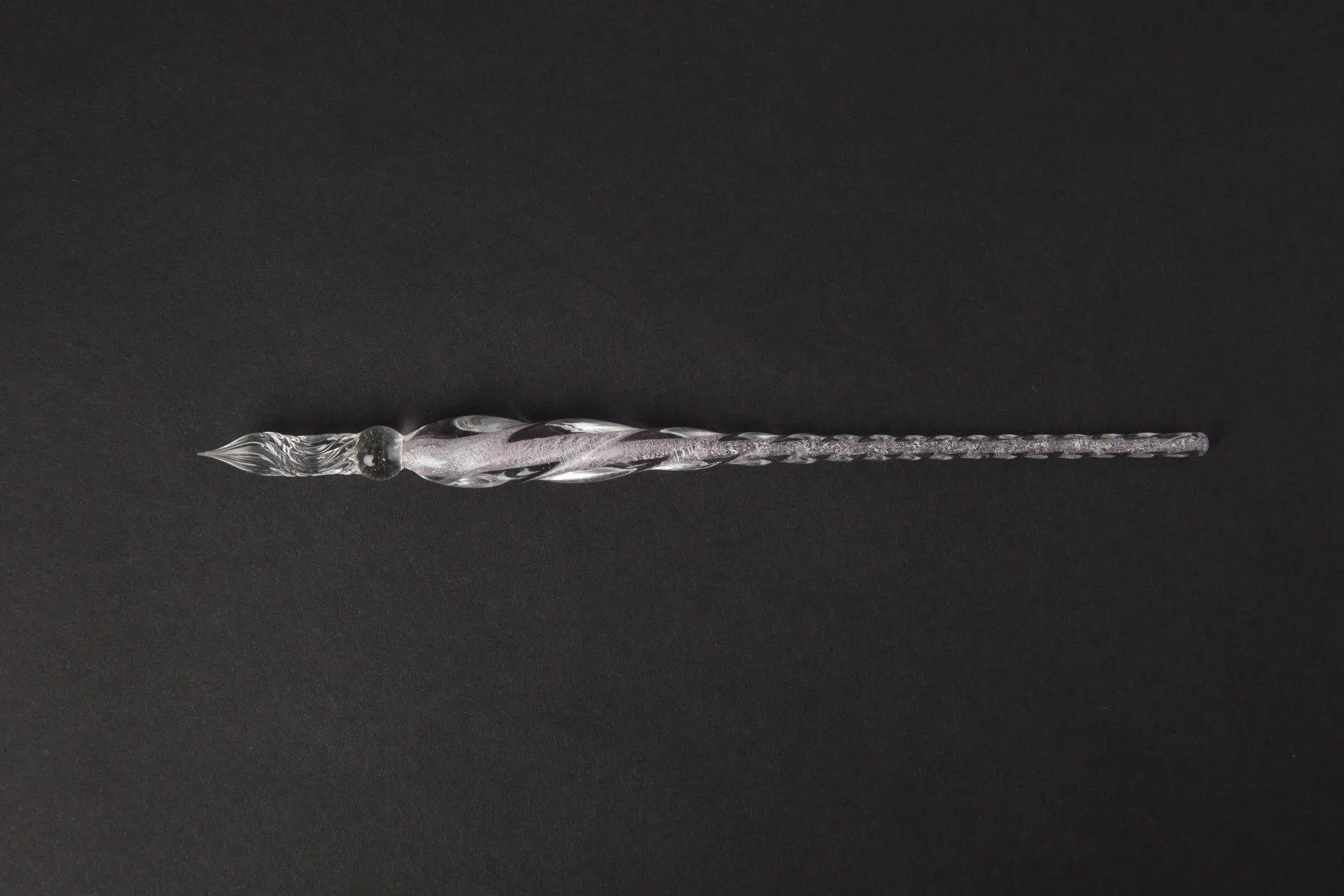 Transparent hand-blown glass crystal pen with coloured ink art effect in choice of 13 colours.