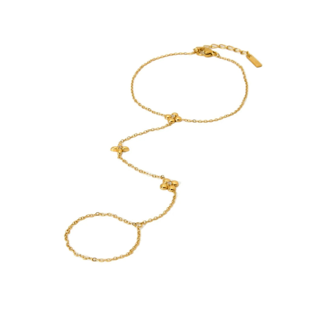 Gold stainless steel women's bracelet with eight-pointed star and floral geometric design