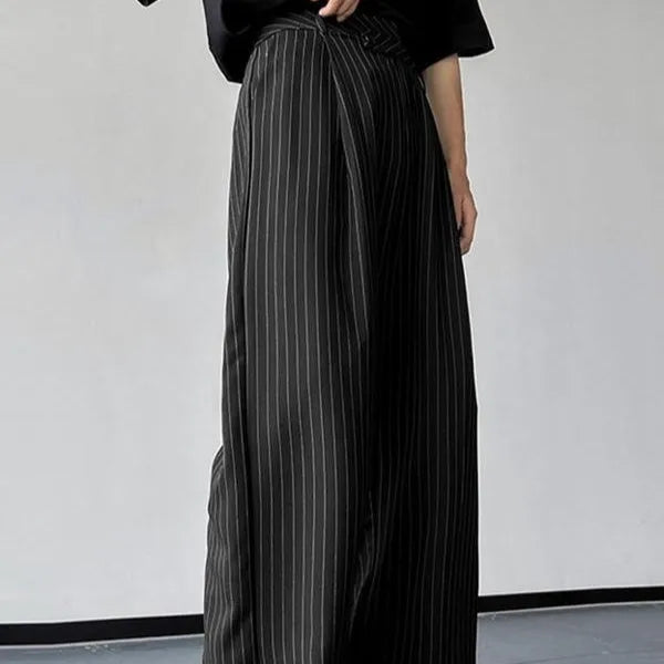 Black men's casual trousers with vertical stripes and pleated design on mannequin