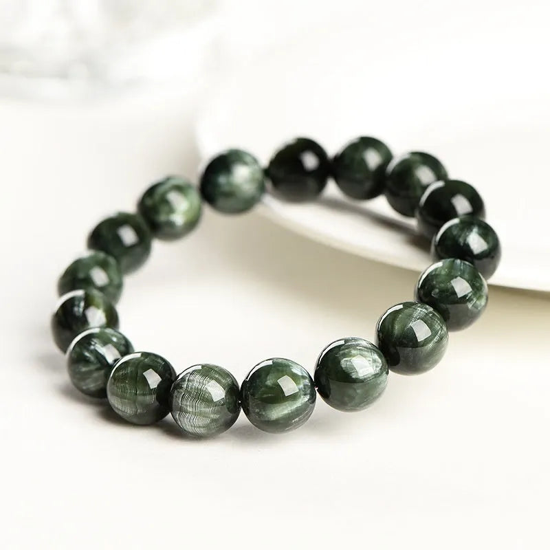 Green Dragon Crystal bracelet with 8-9mm round beads and geometry design featuring Ruyi elements