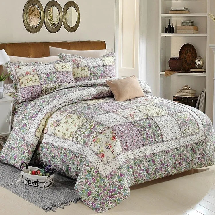 Pure cotton quilted bedspread and pillowcase set in a chosen pattern, laid flat on a bed.