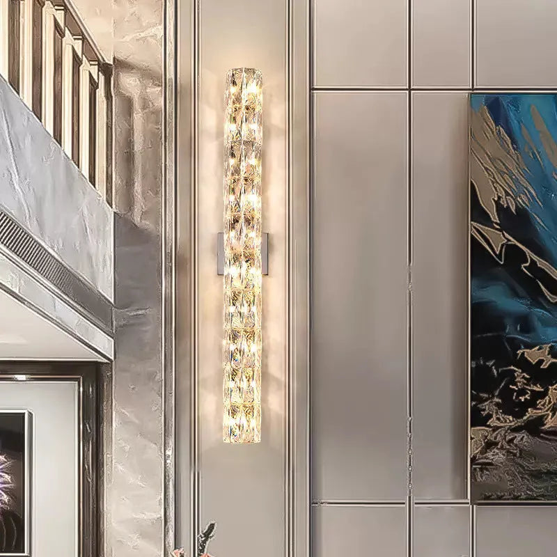 Crystal wall lamp with metallic finish and LED tri-colour lighting in multiple size options