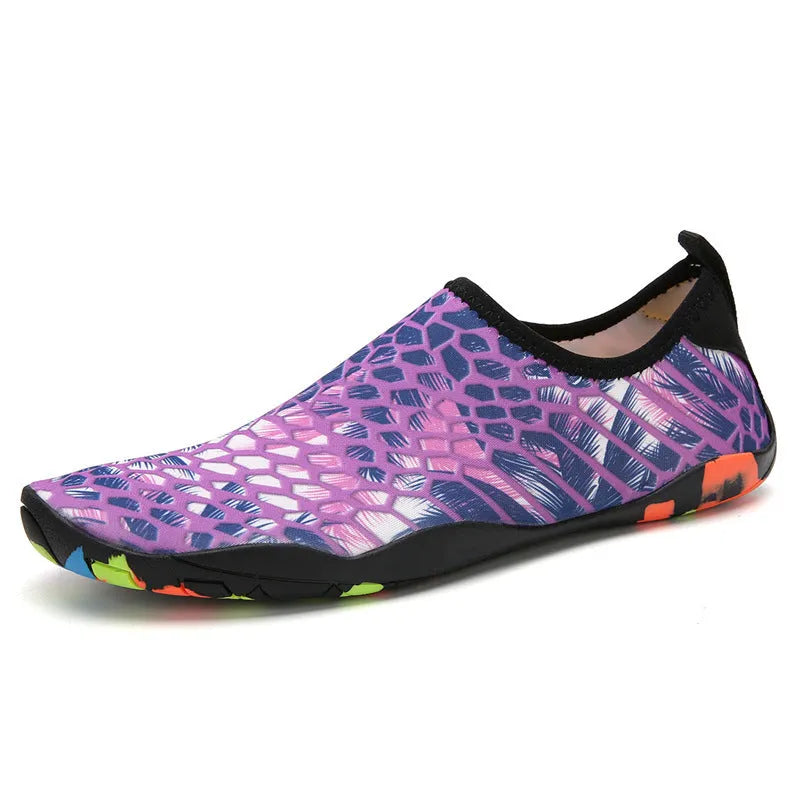 A pair of Lycra beach wading shoes with an EVA midsole, shown in camouflage colour.