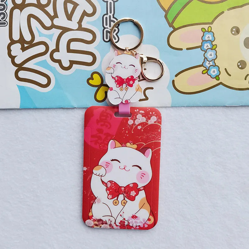 Lucky Cat blessing certificate set showing plastic card sleeve and ferrule pendant in cartoon style.