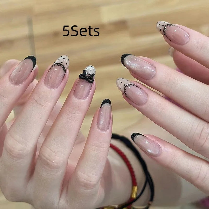 False nails for girls showing short square and coffin shapes in various solid and sparkle colours