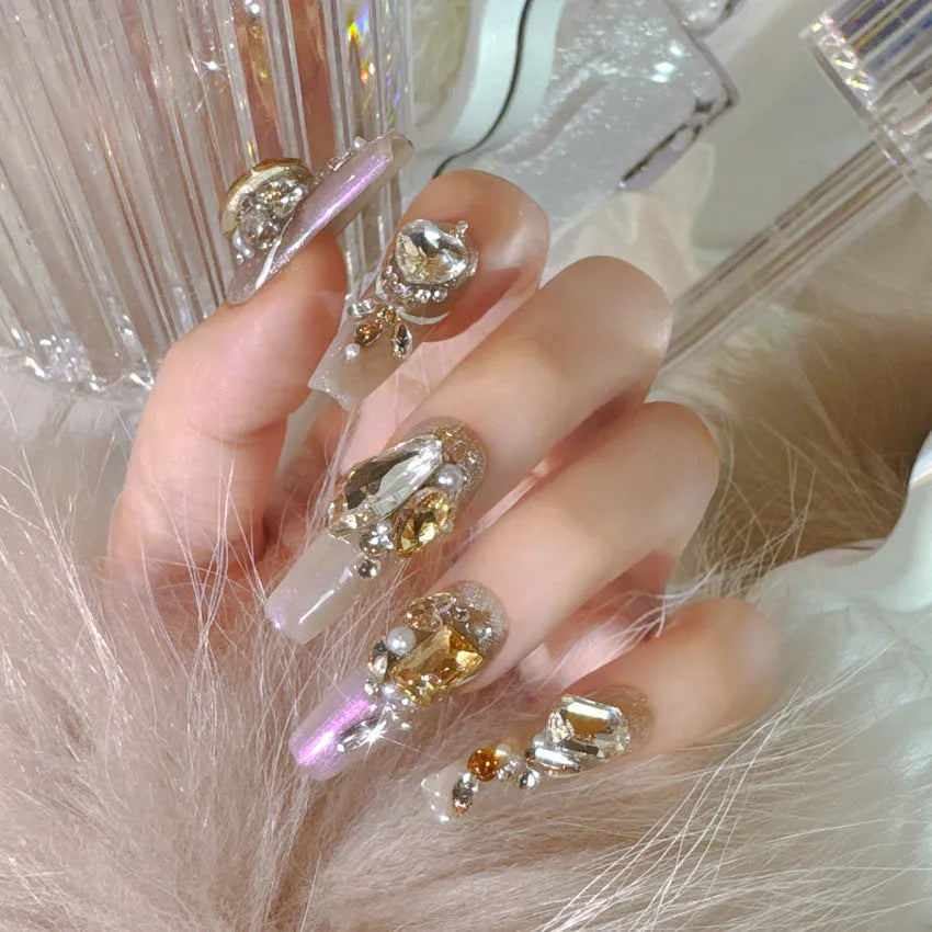 Card of 10 rhinestone-decorated flash style artificial nails for women with jelly adhesive or tool set.