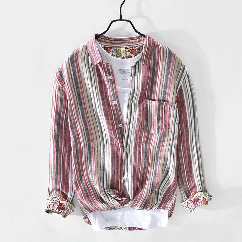 Red and grey striped linen shirt for men on a hanger, showing long sleeves and loose casual fit.