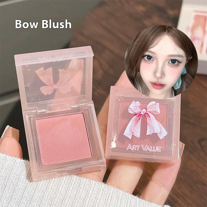 Butterfly box makeup set showing lip muds, powder blusher and necklace