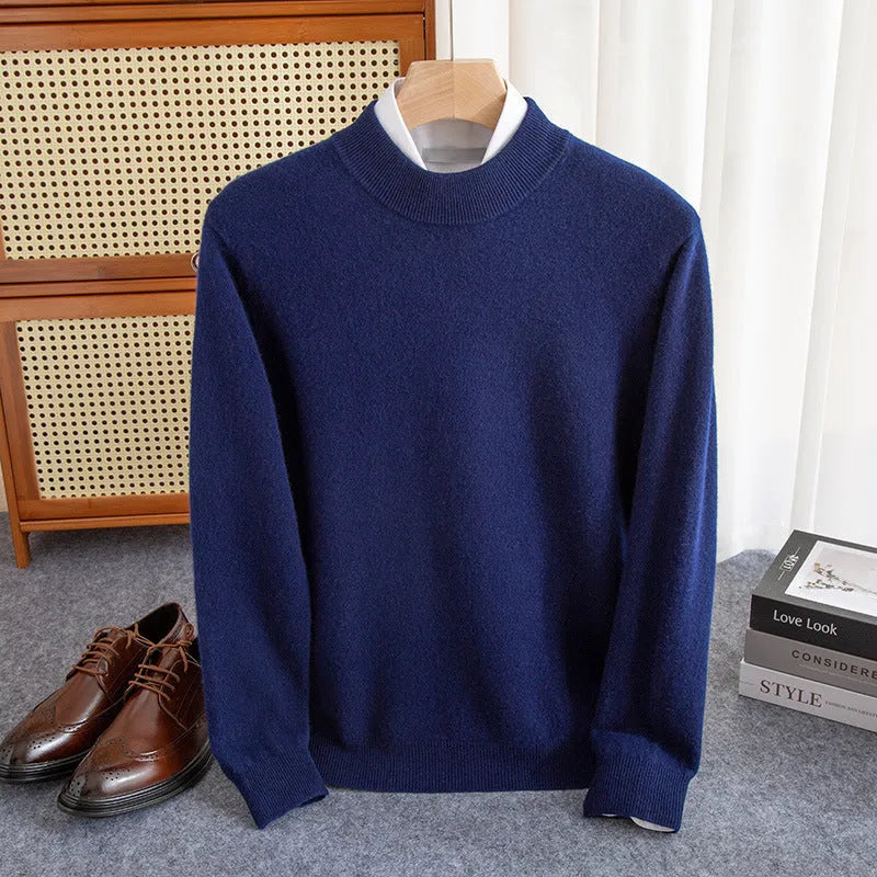 Man wearing a loose-fit half-collar wool sweater in a dark colour, showcasing the knitted texture and neckline design.