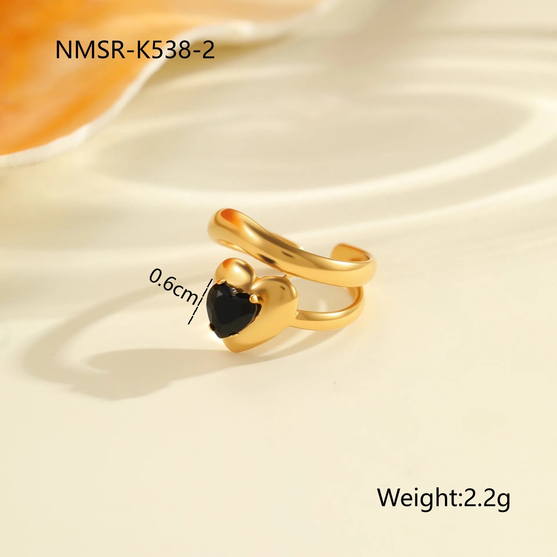 Geometric stainless steel ring for women with zircon detail and open adjustable design.