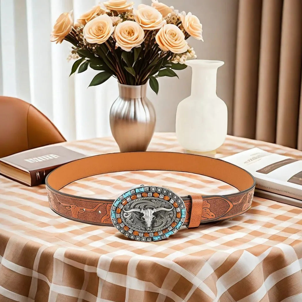 Men's brown leather-look belt with a detailed metal cow head buckle showing carved and embossed details.