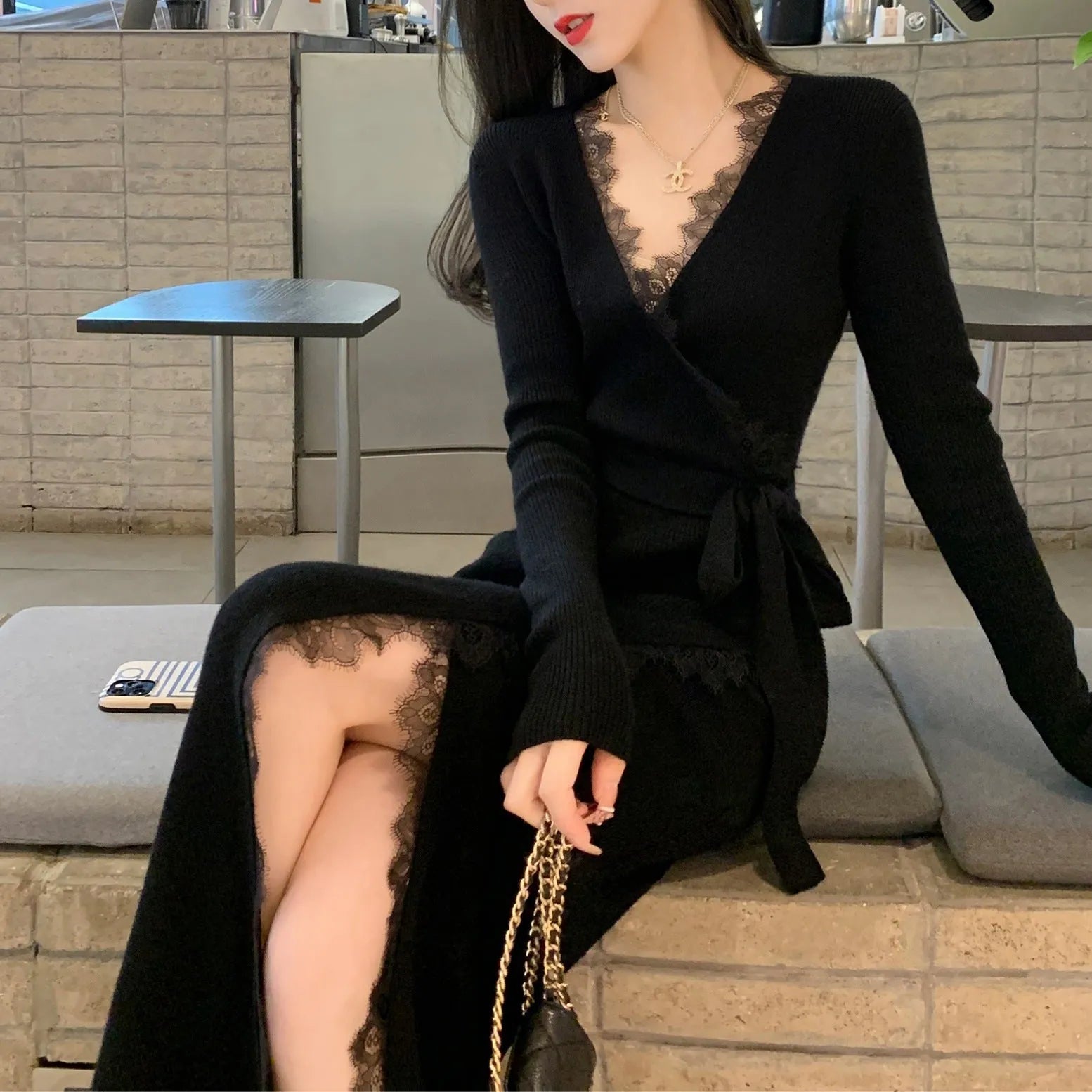 Black women's woolen princess dress skirt with slim fit silhouette and solid colour design