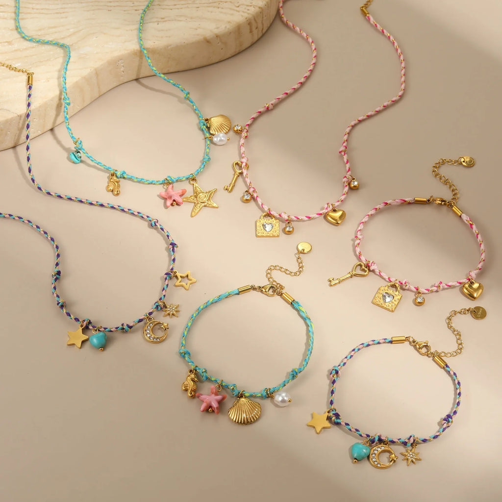 Handmade purple, pink, or blue braided rope and steel necklace or bracelet with heart, star, or geometric pendant.