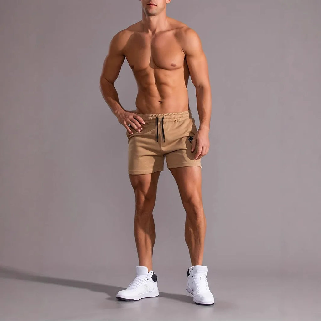 Men's khaki coconut printed sports shorts with elastic waistband and straight leg design